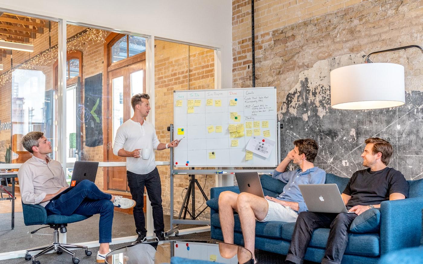 A startup team planning together around a table
